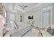 Airy main bedroom with hardwood floors, a ceiling fan, and lots of natural light at 715 Pinckney Dr, Apollo Beach, FL 33572