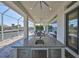 Spacious outdoor kitchen with a large island, stainless steel appliances, and covered patio area for dining al fresco at 715 Pinckney Dr, Apollo Beach, FL 33572