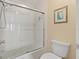 Bathroom featuring a glass-enclosed shower and a framed picture at 7540 Sunshine Skyway S Ln # 219, St Petersburg, FL 33711