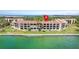 Waterfront condo community with balconies, lush landscaping, and easy access to the water at 7540 Sunshine Skyway S Ln # 219, St Petersburg, FL 33711