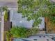 Aerial view of the home showcasing its roof and tree coverage at 847 Highland N St, St Petersburg, FL 33701
