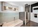 The bathroom features a combined shower and bathtub with mosaic tiling at 847 Highland N St, St Petersburg, FL 33701