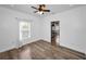 Bright bedroom with hardwood floors, ceiling fan, and lots of natural light at 847 Highland N St, St Petersburg, FL 33701