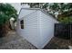 Exterior angle showing the siding of the home and a gated entrance at 847 Highland N St, St Petersburg, FL 33701