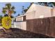 Charming exterior with a dark fence and lush landscaping at twilight at 847 Highland N St, St Petersburg, FL 33701