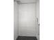Modern shower with geometric tiled walls and handheld shower attachment at 847 Highland N St, St Petersburg, FL 33701
