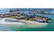 Beautiful waterfront condo community with boat docks, sandy beach, and convenient beach access at 855 Bayway Blvd # 703, Clearwater Beach, FL 33767