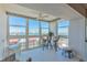 Inviting sunroom with scenic waterfront views and comfortable seating at 855 Bayway Blvd # 703, Clearwater Beach, FL 33767