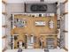 Floor plan illustrating a spacious layout with a garage, kitchen, living, dining areas, bedrooms, and an outdoor patio at 110 W Hiawatha St, Tampa, FL 33604