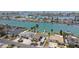 Waterfront houses with canals, private docks, and beautiful views of the bay, creating a desirable coastal lifestyle at 11340 5Th E St, Treasure Island, FL 33706