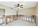 Spacious room featuring exposed concrete block with ceiling fan and neutral wall color at 11340 5Th E St, Treasure Island, FL 33706