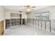 Room featuring an open closet, exposed concrete block and a window allowing natural light at 11340 5Th E St, Treasure Island, FL 33706