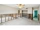 Bright room with an open closet, exposed concrete block and view into green bathroom at 11340 5Th E St, Treasure Island, FL 33706
