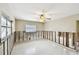Bright room with natural light showcasing exposed concrete block and an open floor plan at 11340 5Th E St, Treasure Island, FL 33706