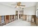 Bedroom with bare walls, fan, and views to a closet and hallway at 11340 5Th E St, Treasure Island, FL 33706