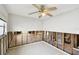 Bedroom with bare walls, window, and view to adjoining bathroom at 11340 5Th E St, Treasure Island, FL 33706