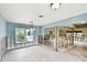 Bright living area featuring tile flooring, natural light, and an open layout ready for personalization and renovation at 11340 5Th E St, Treasure Island, FL 33706