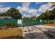 Gated community entrance providing privacy and security, enhancing peace of mind at 11708 Raintree Village Blvd # A, Temple Terrace, FL 33617