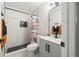 Stylish bathroom featuring modern design, sleek vanity, and walk-in shower at 13250 Ridge Rd # 4B3, Largo, FL 33778