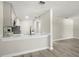 Updated kitchen boasts gray cabinets, new appliances, and modern finishes at 13250 Ridge Rd # 4B3, Largo, FL 33778
