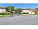 Neighborhood street view showcases manicured landscaping at 13250 Ridge Rd # 4B3, Largo, FL 33778