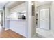 Kitchen area featuring a breakfast bar, stainless steel appliances, and a pantry at 13608 S Village Dr # 6203, Tampa, FL 33618