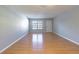 Inviting living room featuring wood flooring and a bright, airy atmosphere at 13608 S Village Dr # 6203, Tampa, FL 33618