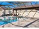 Community pool with clear blue water and plenty of space to relax at 13608 S Village Dr # 6203, Tampa, FL 33618