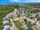 Aerial view showcasing the neighborhood location and scenic water views at 13974 75Th Ave, Seminole, FL 33776