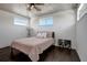 Cozy bedroom with a vaulted ceiling, hardwood floors, and lots of natural light at 13974 75Th Ave, Seminole, FL 33776