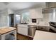 Updated kitchen with stainless steel appliances, granite counters and modern cabinets at 13974 75Th Ave, Seminole, FL 33776