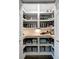 Walk-in pantry with organized shelves and ample storage space at 13974 75Th Ave, Seminole, FL 33776