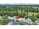 Aerial view of the property, showcasing its location amidst lush greenery and the community layout at 14205 Cypress Ter, Tampa, FL 33618