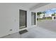 Home entryway with two doors and a well-maintained exterior at 14205 Cypress Ter, Tampa, FL 33618