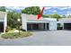 Exterior of the home showing a two-car carport and contemporary architectural design at 14205 Cypress Ter, Tampa, FL 33618