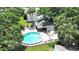 Overhead shot of a community pool featuring lounge chairs and a well-maintained pool area at 14205 Cypress Ter, Tampa, FL 33618