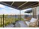 Spacious balcony with comfortable seating offering stunning waterfront views and shaded comfort at 1476 Harbour Walk Rd, Tampa, FL 33602