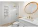 Bathroom featuring a modern vanity, gold fixtures, and a glass-enclosed shower at 1476 Harbour Walk Rd, Tampa, FL 33602