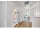 Bright hallway leading to bathroom, bedroom and views of the balcony at 1476 Harbour Walk Rd, Tampa, FL 33602