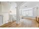 Bright open living area with hardwood floors, white walls, and stylish furnishings at 1476 Harbour Walk Rd, Tampa, FL 33602