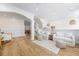 Spacious open living area with hardwood floors, white walls, and stylish furnishings at 1476 Harbour Walk Rd, Tampa, FL 33602