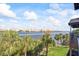 Enjoy tranquil water views from this condo's private balcony with lush green landscaping at 1476 Harbour Walk Rd, Tampa, FL 33602