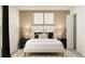 Inviting bedroom with neutral tones, a plush bed, and stylish decor at 15262 Rainbow Quartz St, Wimauma, FL 33598