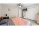 Comfortable bedroom with a ceiling fan, closet, and natural light at 15428 Atwater Dr, Brooksville, FL 34604