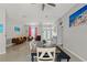 Open-concept dining and living area with natural light and a view of the home's entrance at 15428 Atwater Dr, Brooksville, FL 34604
