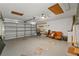 Spacious garage featuring ample space, with automatic door, and ceiling fan at 15428 Atwater Dr, Brooksville, FL 34604
