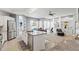 Open-concept living area with granite counters, stainless steel appliances, and comfortable seating at 15428 Atwater Dr, Brooksville, FL 34604