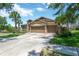 Charming home with a three-car garage, well-maintained landscaping, and an inviting curb appeal at 15635 Starling Water, Lithia, FL 33547