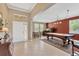 Elegant foyer with ample natural light and access to the game room at 15635 Starling Water, Lithia, FL 33547