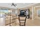 Bright and airy living room with tile flooring and stylish furnishings at 15635 Starling Water, Lithia, FL 33547